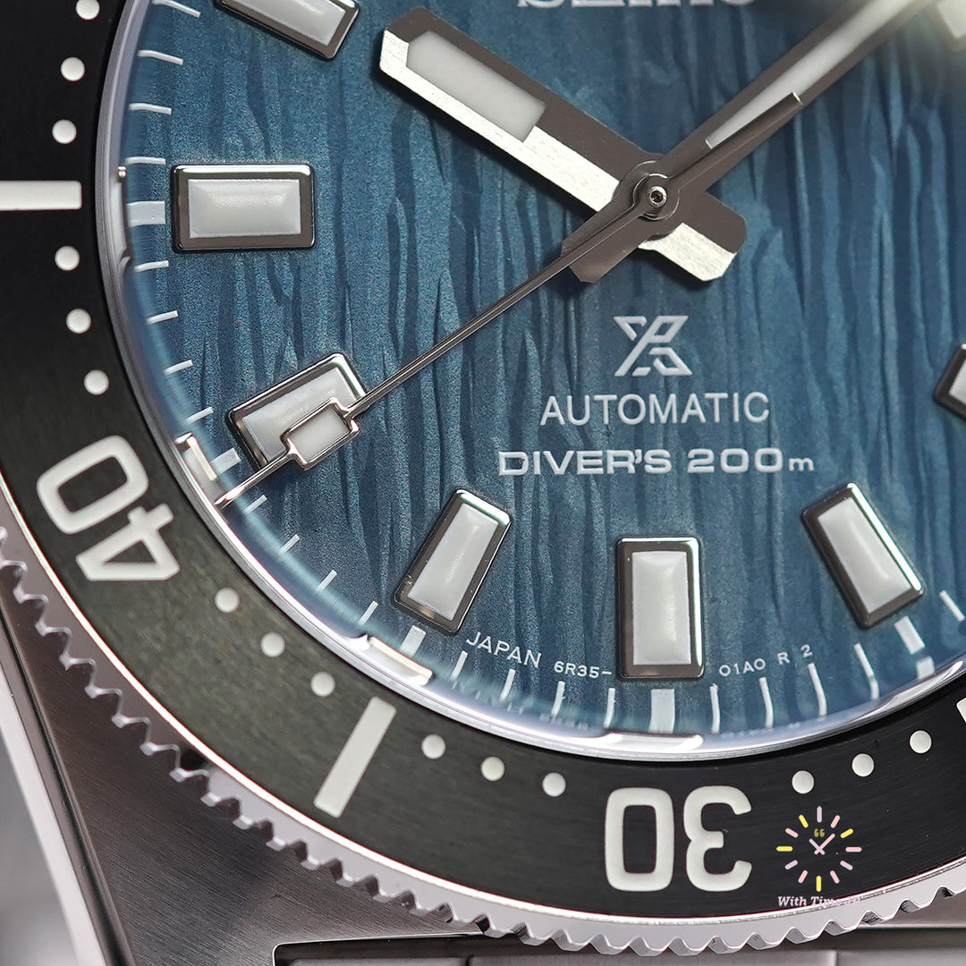 Seiko Prospex SBDC165,Automatic Diver's Watch, stainless steel Case, deep blue Dial, stainless steel Band, Close-up of deep blue Dial.