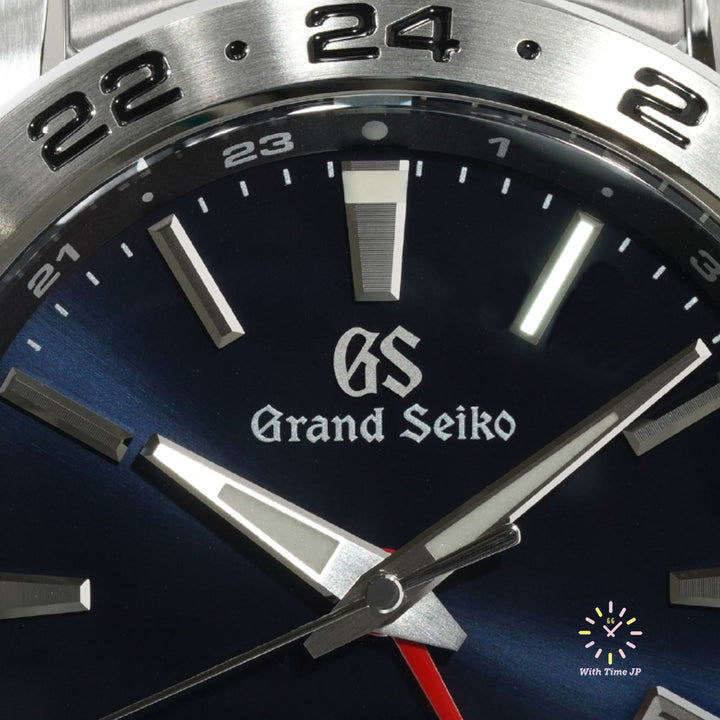 Grand Seiko SBGM245 Automatic GMT Men's Watch close-up of the blue dial.