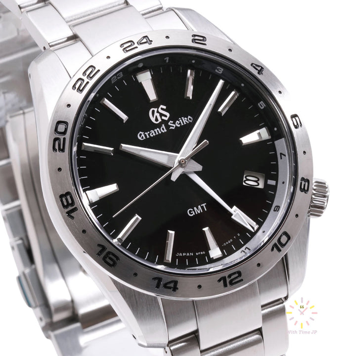 Grand Seiko SBGN027, Quartz Men's Watch,Close-up of black dial from front angle.