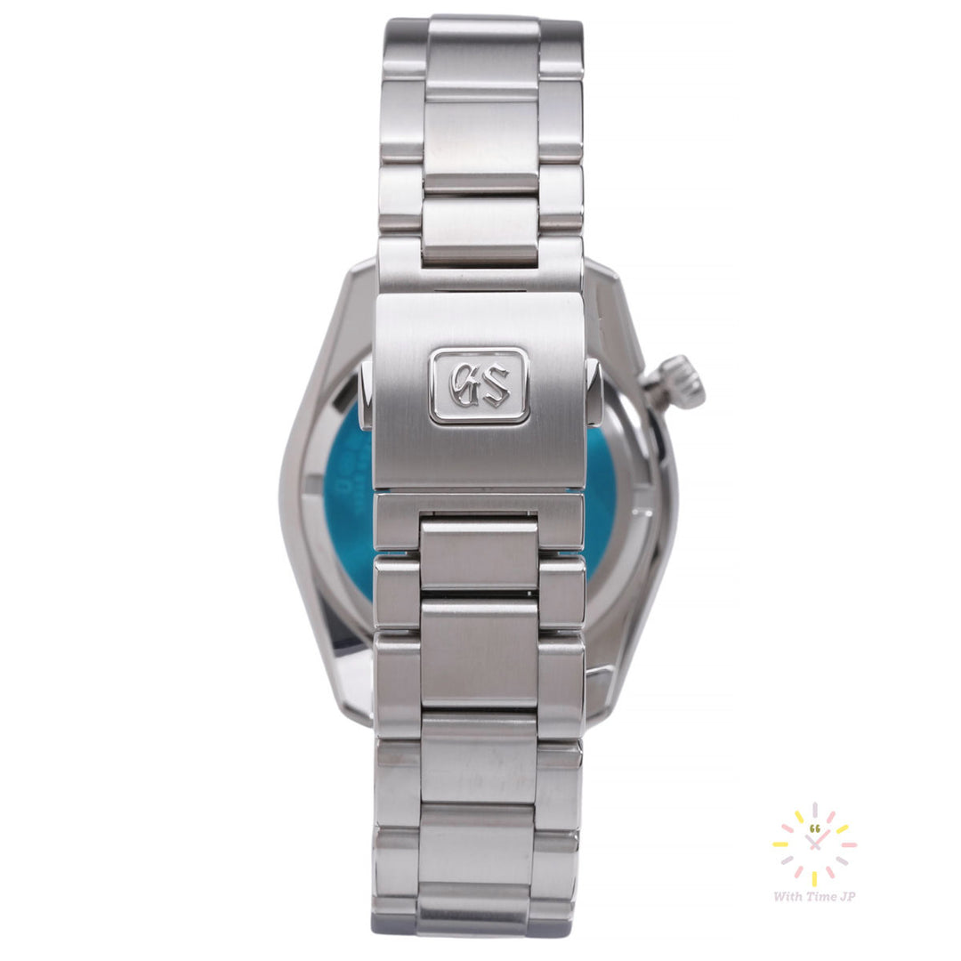 Grand Seiko SBGN027, Quartz Men's Watch, Triple link stainless steel bracelet and clasp.