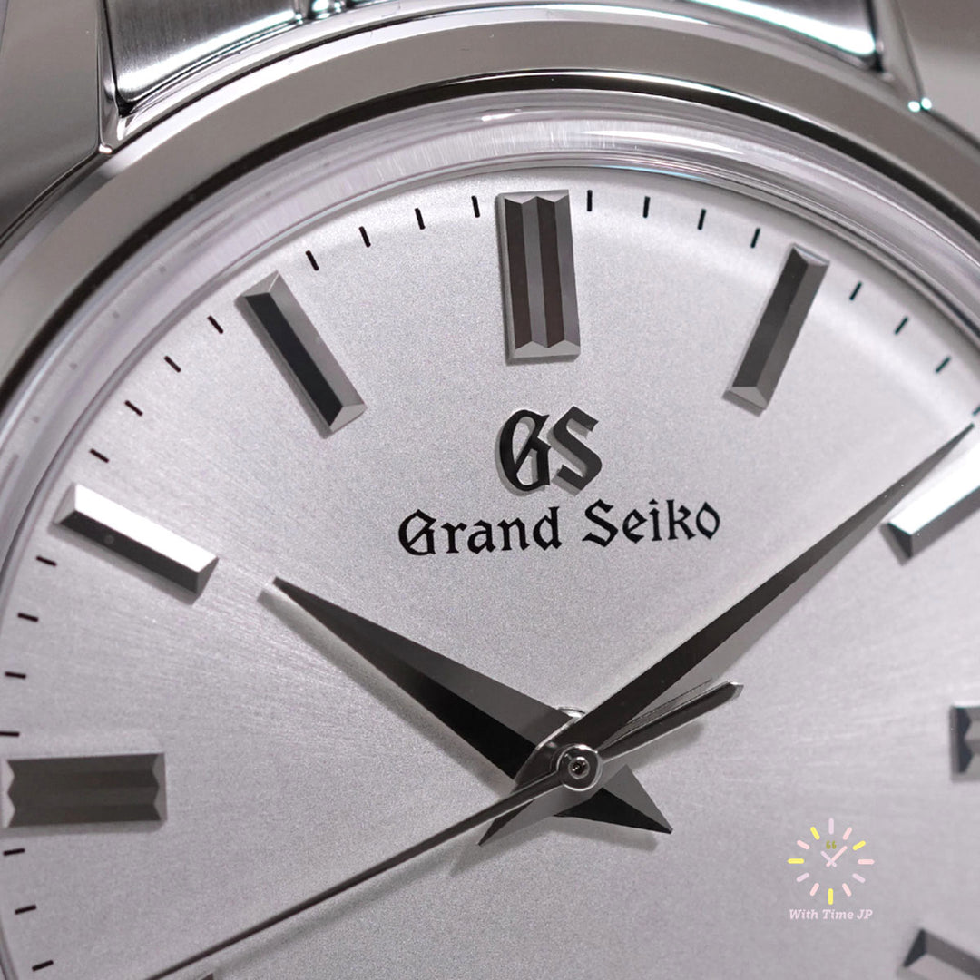 Grand Seiko SBGW305, Hand-wound Men's Watch, Close-up of silver dial.