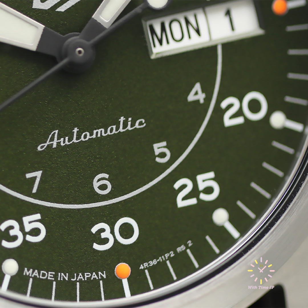 SEIKO 5 SPORTS SBSA141 Close-up of the green dial 6 o'clock side of the automatic watch.