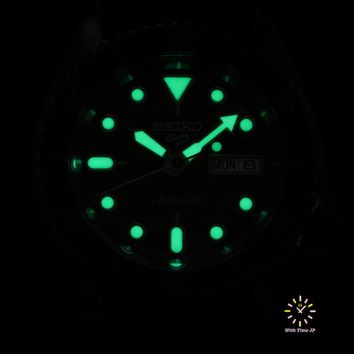 LumiBrite hands and markers glowing on the Seiko 5 Sports SBSA173.