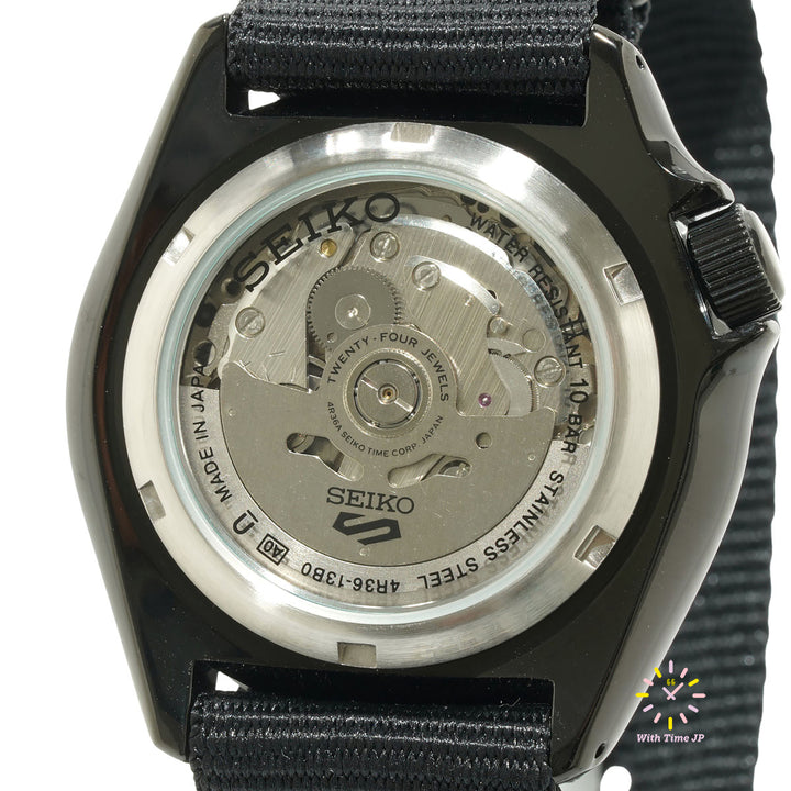 See-through case back of the Seiko 5 Sports SBSA173, showing the movement.