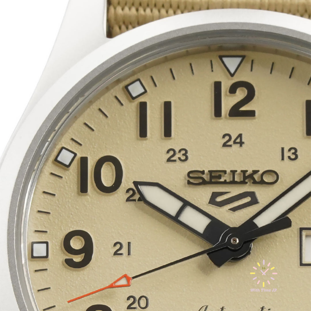 SEIKO 5 SPORTS SBSA199 Close-up of the sand-colour dial of the automatic watch.