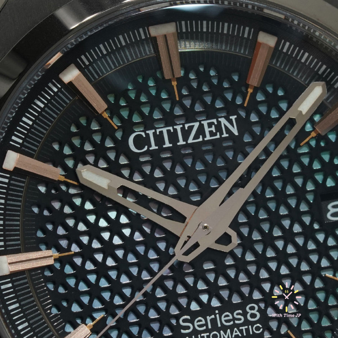 CITIZEN Series Eight NA1015-81Z Mechanical Watch Close-up of white butterfly shell and metal dial