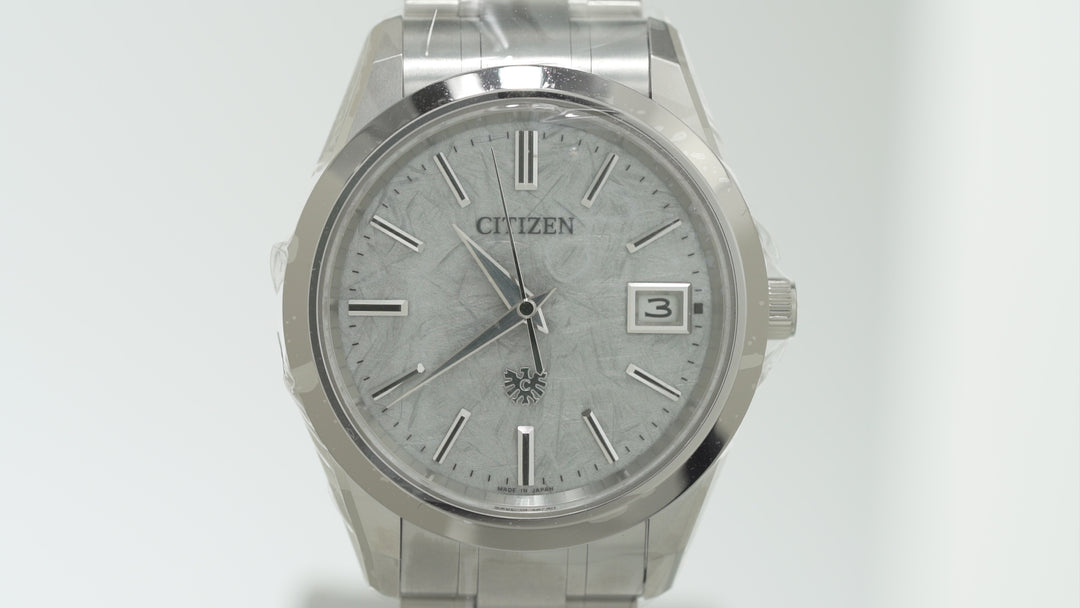 The Citizen High Precision Eco-Drive AQ4100-57B Metallic painted dial