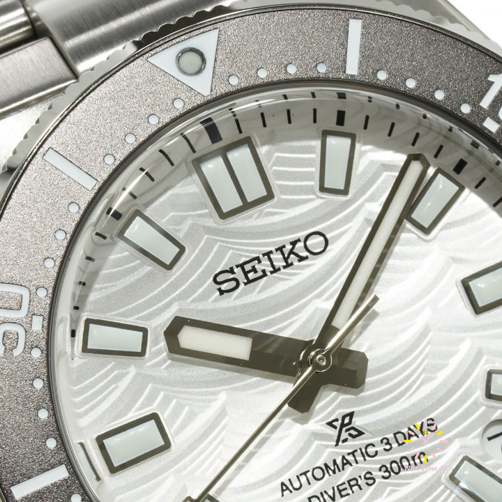 Close-up of the silver dial of SBDC213, 12 o'clock side