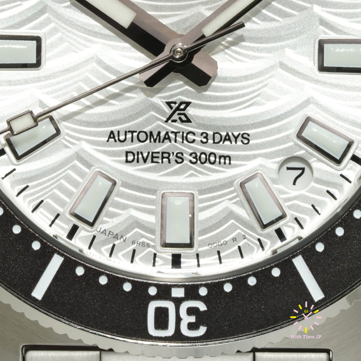 Close-up of the silver dial of SBDC213, 6 o'clock side