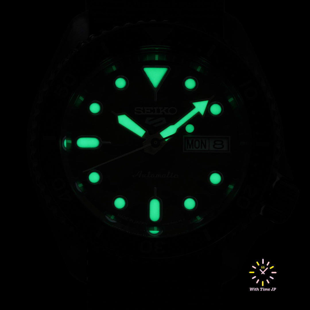 LumiBrite hands and markers glowing on the Seiko 5 Sports SBSA173.