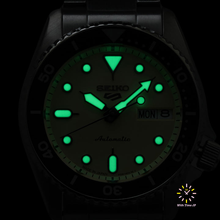 LumiBrite hands and markers glowing on the Seiko 5 Sports SBSA227.
